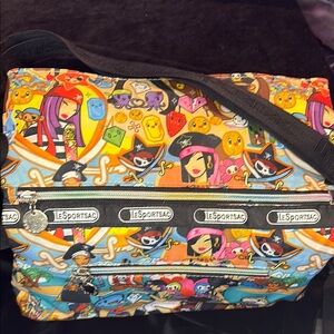 LeSportsac Red and Pink Crossbody Bag with Playful Design